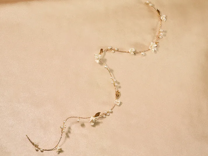 Joyería para el cabello en oro claro con flores